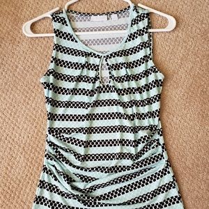 Sleeveless top with black and aqua dots